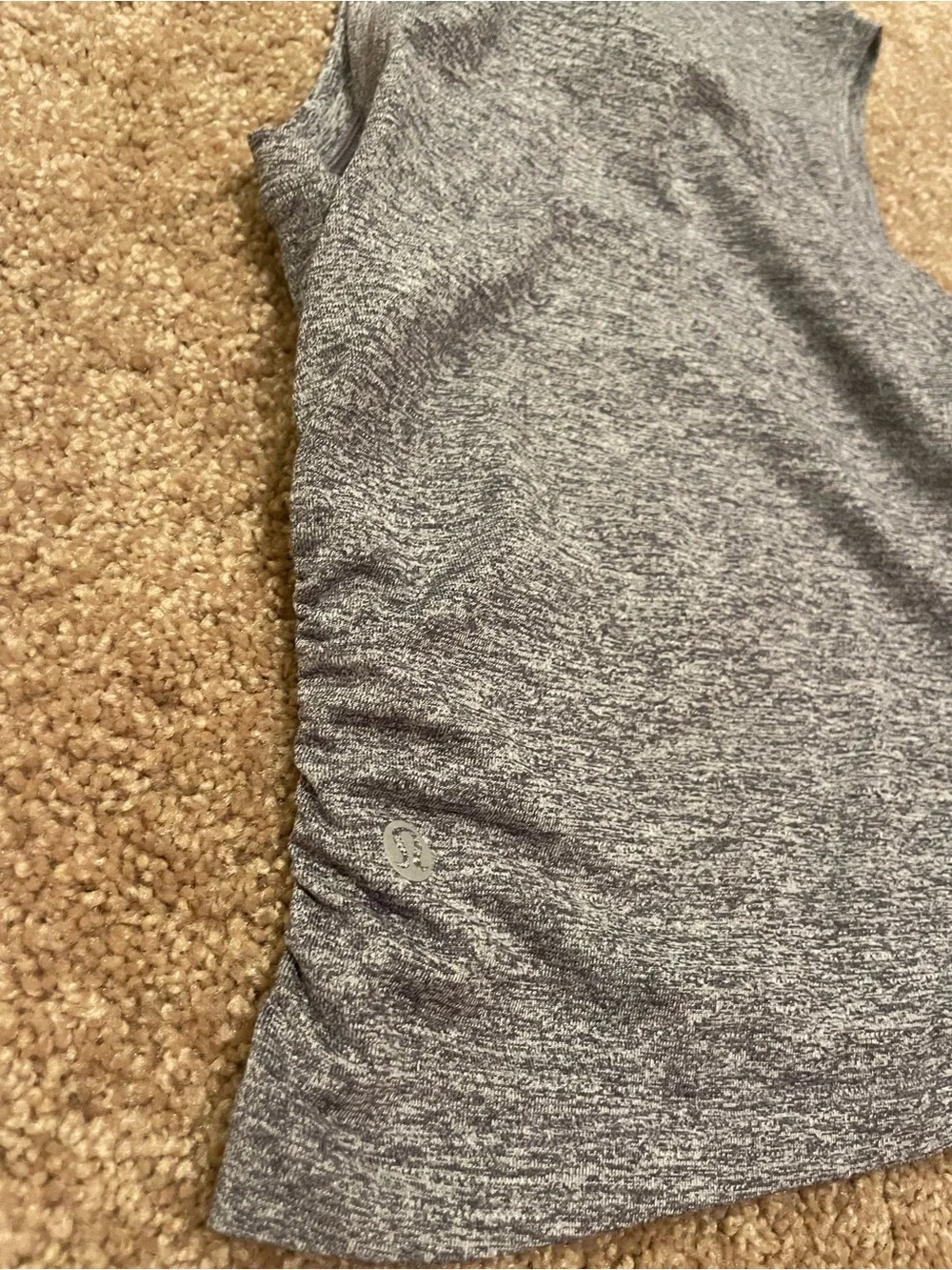 Lululemon License to Train Tight-Fit tank in heathered true navy color